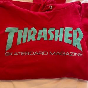 Red Thrasher hoodie with blue letters